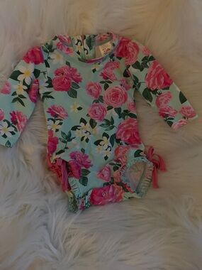 Ruffle Butts Mint Floral Ruffle-Tie One-Piece